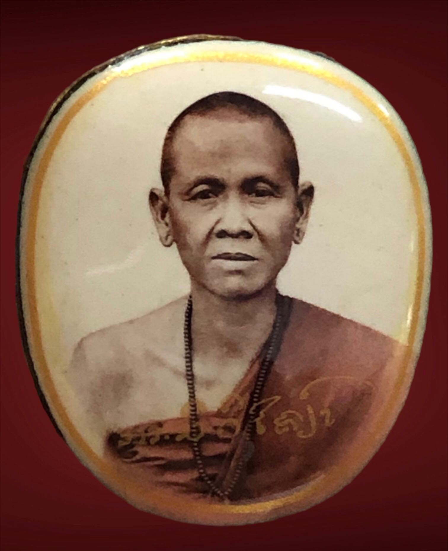 ล็อกเก็ตหลังทองคำครูบาเจ้าศรีวิไชย วัดพระนอนแม่ปูคา